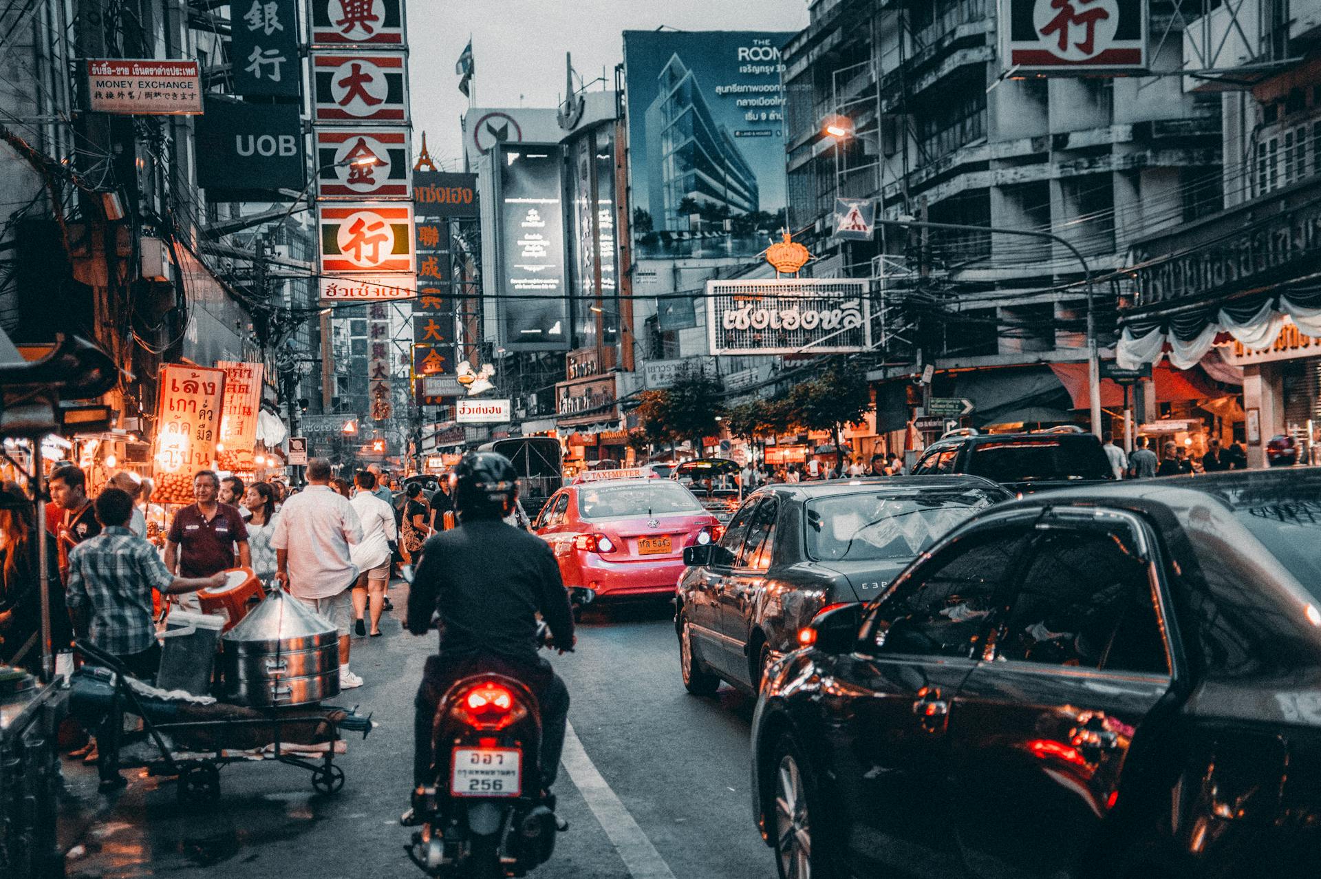 Immerse in Bangkok’s vibrant markets with rain gear
